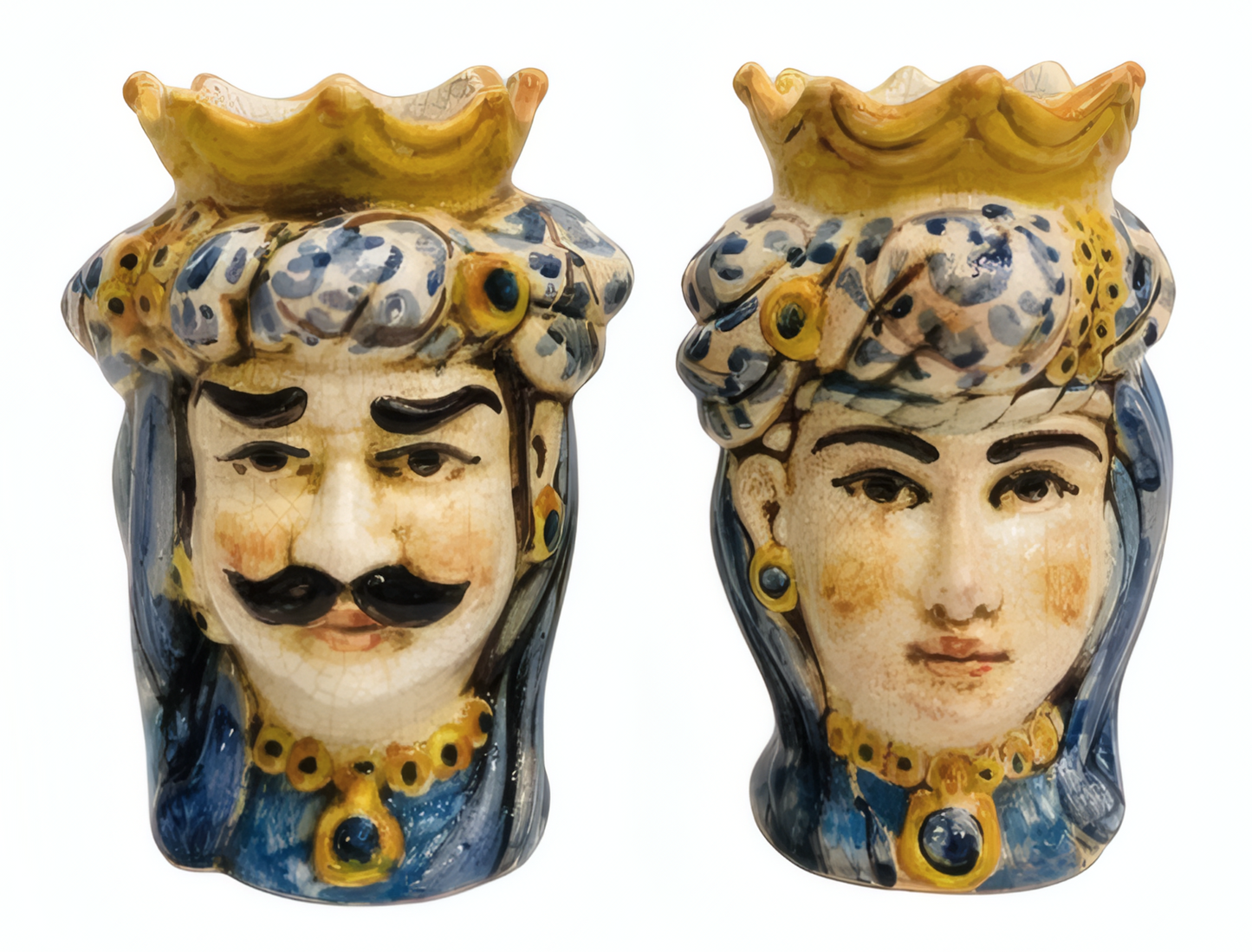 Pair of polychrome Moor's Heads H 14